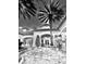 Charming courtyard with stone pavers, outdoor seating, and views of the building's architecture and landscaping at 8907 Legacy Ct # 14 205, Kissimmee, FL 34747