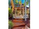 Gazebo featuring a wooden structure with seating, ideal for outdoor relaxation and gatherings at 8907 Legacy Ct # 14 205, Kissimmee, FL 34747