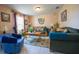 Cozy living room with comfortable furniture, a decorative rug, and a bright, inviting atmosphere at 905 Gloucester Ct, Kissimmee, FL 34758