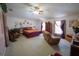 Spacious main bedroom featuring a large bed, comfortable furniture, and ample natural light at 905 Gloucester Ct, Kissimmee, FL 34758
