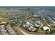 Community aerial view showcasing the multiple pools, ponds, and community layout and landscaping at 9075 Dogleg Dr, Davenport, FL 33896