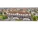 Birds-eye view of townhomes with private screened in patios and well-maintained exteriors at 9075 Dogleg Dr, Davenport, FL 33896