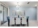 Dining area featuring a sliding glass door and contemporary lighting at 9075 Dogleg Dr, Davenport, FL 33896