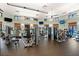 Spacious fitness center with modern exercise equipment and natural lighting at 9075 Dogleg Dr, Davenport, FL 33896