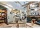 A luxurious lobby showcasing exquisite design elements with sleek furnishings, and abundant natural light at 9075 Dogleg Dr, Davenport, FL 33896