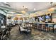 Upscale restaurant with a fully stocked bar, ample seating and televisions for patrons to enjoy at 9075 Dogleg Dr, Davenport, FL 33896