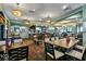 An interior shot of the restaurant showing the bar and dining area with comfortable seating and ambient lighting at 9075 Dogleg Dr, Davenport, FL 33896