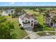 Beautiful home with a well-maintained lawn, mature trees, and charming curb appeal in a golf community at 107 Troon Cir, Davenport, FL 33897