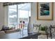 Kitchen breakfast bar with champagne and outdoor view at 107 Troon Cir, Davenport, FL 33897