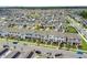 An aerial view of a neighborhood with the highlighted home at 11473 Listening Dr, Orlando, FL 32832
