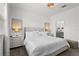 Bright bedroom with a large window, neutral decor, and carpet flooring at 11473 Listening Dr, Orlando, FL 32832
