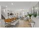 Open-concept living area with tile floors, modern decor, and plenty of natural light at 11473 Listening Dr, Orlando, FL 32832
