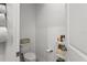 Clean and simple powder room featuring a toilet and storage shelves at 11473 Listening Dr, Orlando, FL 32832