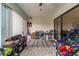Sunroom with brick floors, ceiling fan and sliding glass doors at 117 Coventry Ln, Haines City, FL 33844