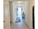 Inviting entryway featuring neutral colors and an elegant rug at 1241 Denali Dr, Winter Haven, FL 33881