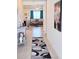 Inviting entryway featuring neutral colors and an elegant rug at 1241 Denali Dr, Winter Haven, FL 33881