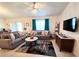 Comfortable living room featuring modern decor and ample seating at 1241 Denali Dr, Winter Haven, FL 33881