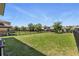 Expansive fenced backyard, perfect for outdoor activities and entertaining with lush lawn and privacy at 1338 Riley Cir, Deland, FL 32724