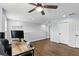 Open loft space with a ceiling fan and wood flooring, perfect for relaxing or working at 1338 Riley Cir, Deland, FL 32724