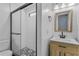 Bathroom featuring a glass shower, vanity, and modern fixtures at 13959 Marine Dr, Orlando, FL 32832
