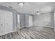 Spacious bedroom with modern flooring, ceiling fans, and multiple closets at 13959 Marine Dr, Orlando, FL 32832