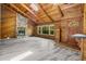 Inviting interior featuring a stone fireplace, wood-paneled walls, and stylish flooring at 13959 Marine Dr, Orlando, FL 32832