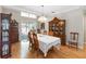 Dining room with hardwood floors, china cabinets and backyard views at 1730 King Henry Dr, Kissimmee, FL 34744
