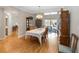 Formal dining room with elegant furnishings, hardwood floors, and natural light at 1730 King Henry Dr, Kissimmee, FL 34744