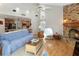 Inviting living room with vaulted ceilings, fireplace and connected kitchen at 1730 King Henry Dr, Kissimmee, FL 34744