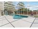 Screened-in pool with ample deck space and outdoor seating at 1730 King Henry Dr, Kissimmee, FL 34744