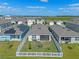 Home featuring a fenced backyard and screened-in lanai in a desirable neighborhood at 1774 Walnut Creek Dr, Kissimmee, FL 34744