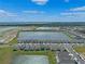 Beautiful lakefront community showcasing numerous homes alongside tranquil waters at 1774 Walnut Creek Dr, Kissimmee, FL 34744
