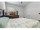 Comfortable bedroom with dresser, TV, and plush bedding in a well-lit space at 1774 Walnut Creek Dr, Kissimmee, FL 34744