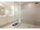 Well-lit bathroom with a spacious walk-in shower and a modern vanity at 1868 Sanibel Dr, Davenport, FL 33896