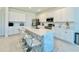 Well-equipped kitchen with stainless steel appliances and a large island at 1868 Sanibel Dr, Davenport, FL 33896