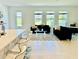 Open-concept living and kitchen area perfect for entertaining and Gathering gatherings at 1868 Sanibel Dr, Davenport, FL 33896