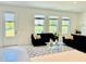 Living room with a view of the lake at 1868 Sanibel Dr, Davenport, FL 33896