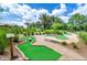 Community mini-golf course surrounded by lush landscaping at 1868 Sanibel Dr, Davenport, FL 33896
