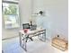 Cozy home office with stylish desk and natural light at 1868 Sanibel Dr, Davenport, FL 33896