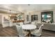 Clubhouse lounge with a modern kitchen, bar seating, and comfortable seating area at 1872 Summer Serenity Dr, Kissimmee, FL 34744