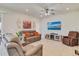 Comfortable living room with tile flooring, recessed lighting, and a ceiling fan at 1872 Summer Serenity Dr, Kissimmee, FL 34744