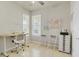 Bright office space with two large windows and two chairs at 1872 Summer Serenity Dr, Kissimmee, FL 34744