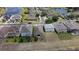 A stunning aerial view of a vibrant residential community with lush landscaping and serene lakes at 195 Preston Ave, Davenport, FL 33837