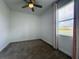 Cozy bedroom featuring a ceiling fan, natural light, and a serene atmosphere at 195 Preston Ave, Davenport, FL 33837