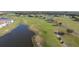 Picturesque golf course with lush green fairways, scenic water features, and well-maintained landscaping at 195 Preston Ave, Davenport, FL 33837