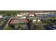 Aerial view of community tennis courts and recreational area, featuring a pool and playground at 195 Preston Ave, Davenport, FL 33837