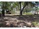 Large lot with mature trees, shed-like structures and storage at 206 Willow St, Lake Wales, FL 33859