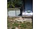 Outdoor propane tank sitting next to a building exterior with a chain link fence nearby at 206 Willow St, Lake Wales, FL 33859