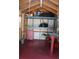 Interior view of a shed with shelves and storage, tools and other items present at 206 Willow St, Lake Wales, FL 33859
