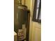 Rheem Performance water heater in utility area at 206 Willow St, Lake Wales, FL 33859